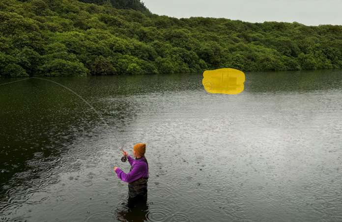 Photo of a woman fly-fishing in a stream, Pixelmator Pro tool removing unwanted objects